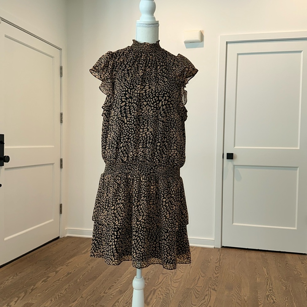 Modern, multi season, flowy, animal print dress!